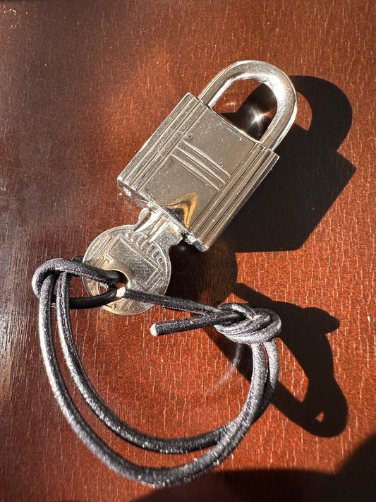 Hermes palladium lock and key